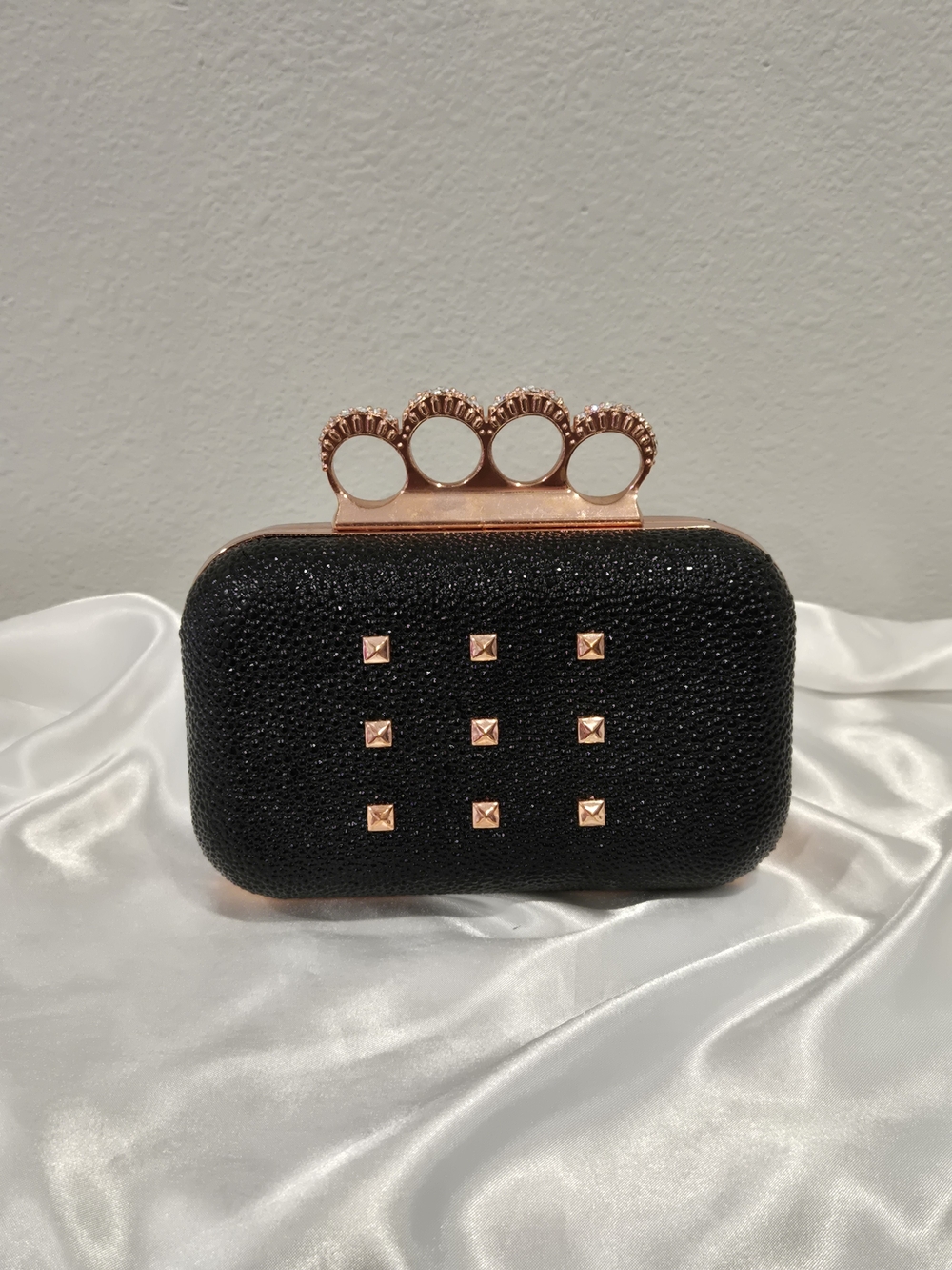Rihanna Rogue Black Clutch with Rose Gold Knuckle Handle and Studs GWP